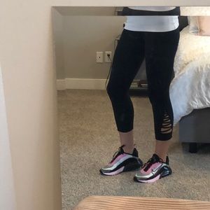 Athleta black pants with cut out.